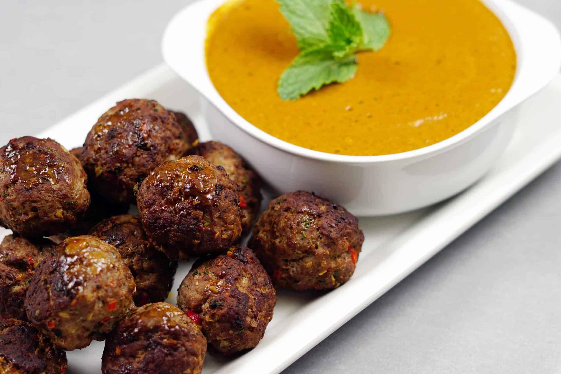 Lamb Meatballs with Curry Sauce via @eatahfood